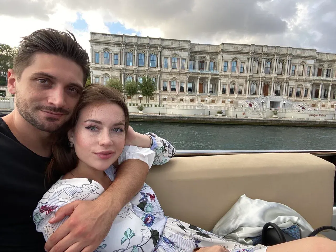 Garrett and Veronika together in front of a grand building.